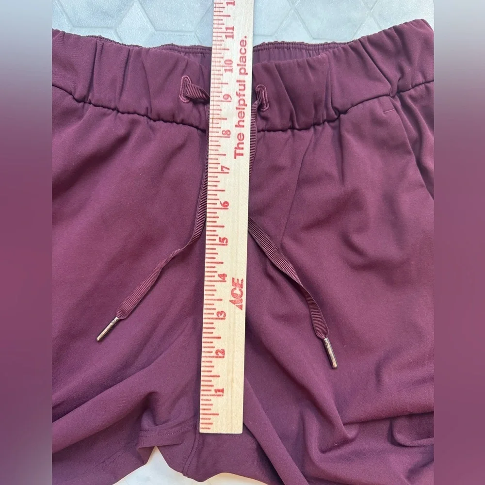 Lululemon On the Fly 7/8 Pants Dark Adobe Maroon Size 4 EUC